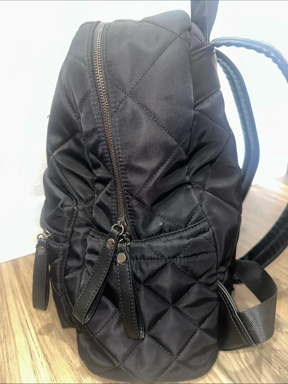 Peloton Black Quilted Men's Backpack with Front Zip Pocket
